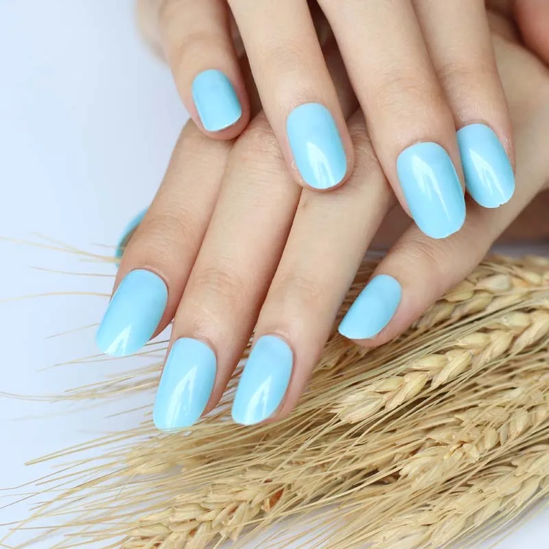 

2019 24pcs Adorable fashion candy oval decorative fake nails short round section Tender Blue P125X