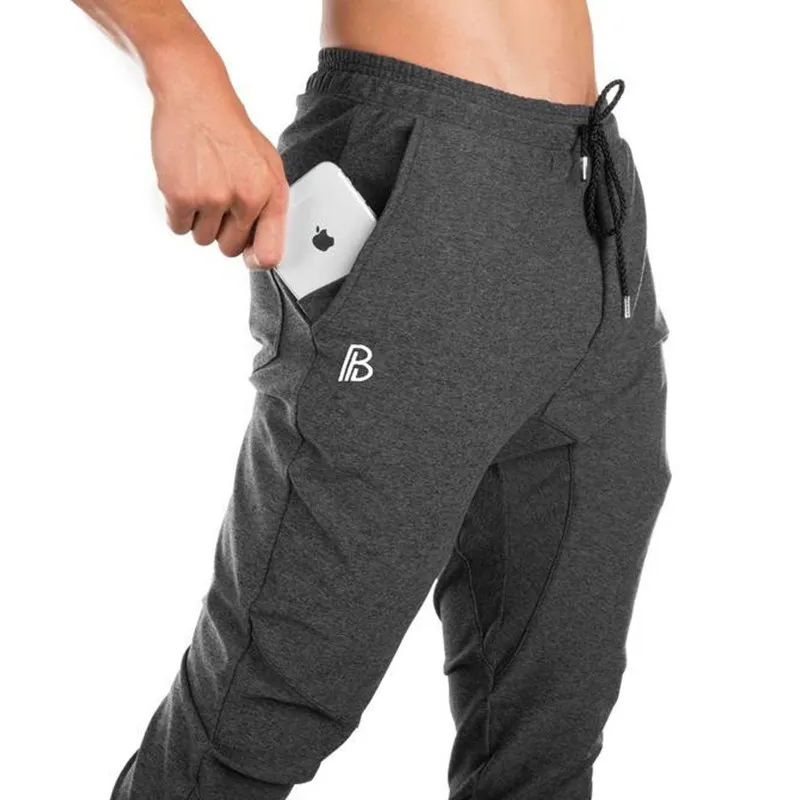 الجمنازيوم رجل ركض Sweatpants عارضة السراويل الترنك اللياقة البدنية الرياضية الرجال تجريب كمال الاجسام عداء ببطء طويل السراويل نحيل السراويل