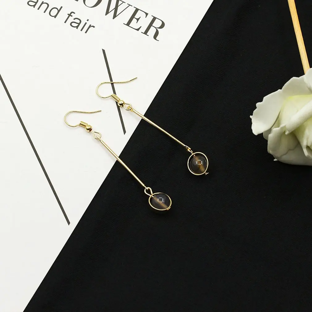 

Beautiful wild temperament fashion simple retro earrings natural stone earrings long ear no trace ear clip