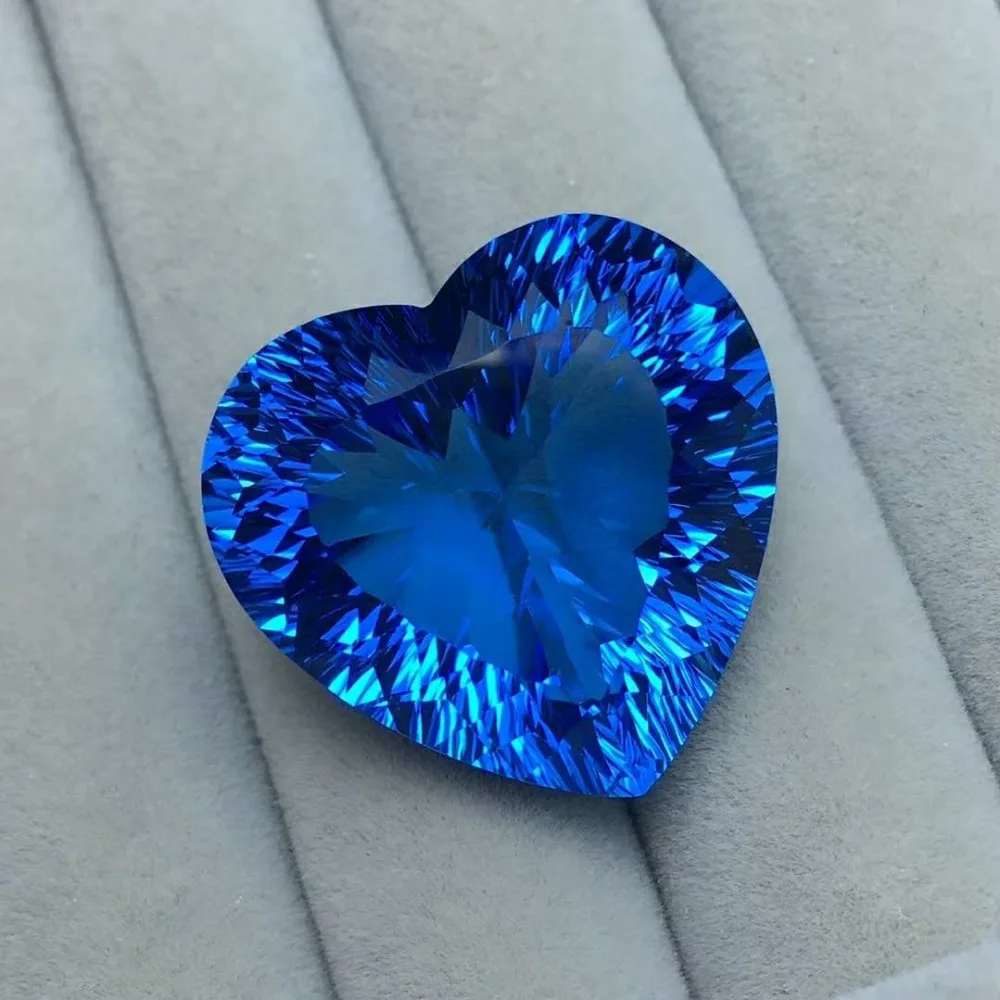 

Jewelry, 52.8CT Topaz heart shaped gem, specifications: 22.8 x 23.4 x 13.8mm, quality assurance perfect gemstone.