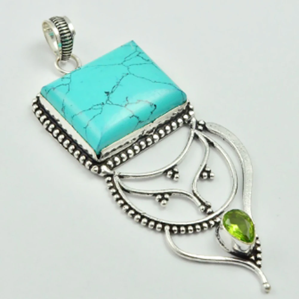 

Turquois & Peridots Pendant Silver Overlay over Copper , 80 mm, P3028