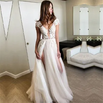 

Gorgeous Deep V Neck Cap Sleeve Wedding Dresses 2020 Appliques Lace Bridal Gowns Sexy Split Tulle Vestido de Noiva Backless