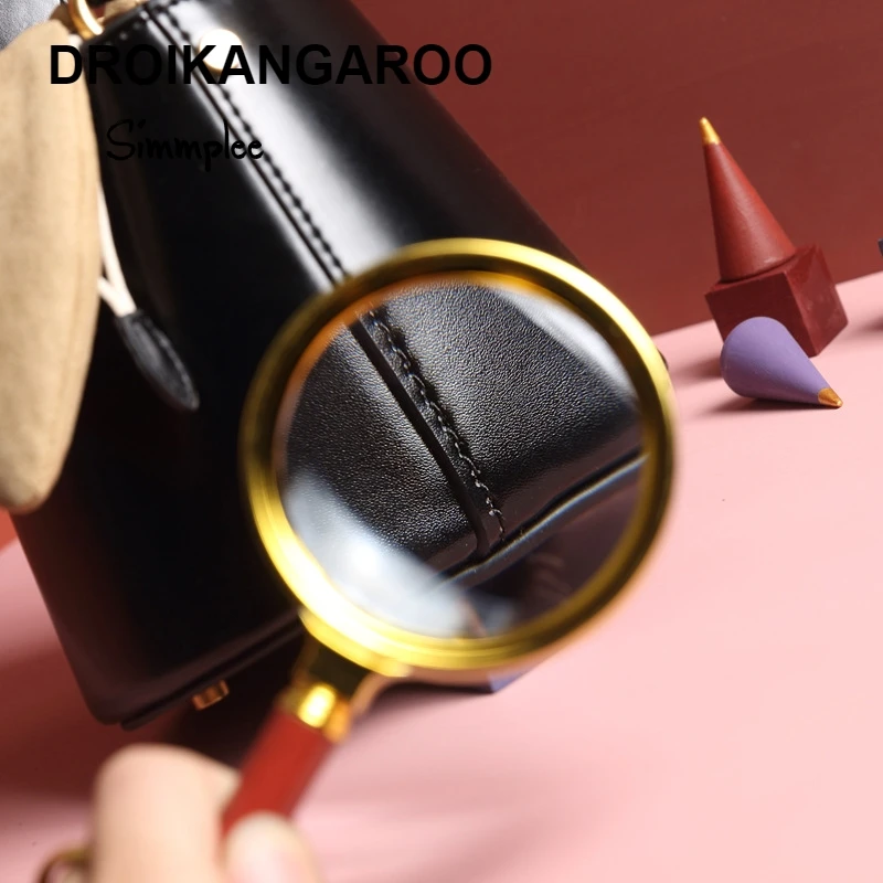 

Small crowd Design Leather Ladies Bag bucket ladies bag 2019 new bow knot one shoulder slanting handbagShoulder Luxury Handbags
