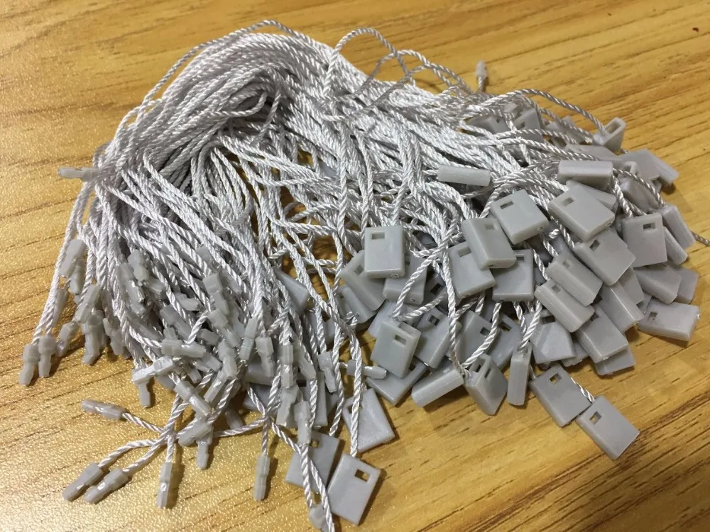 

Free shiping High quality gray hang tag string hang tag strings cord for garment stringing price hangtag or seal tag