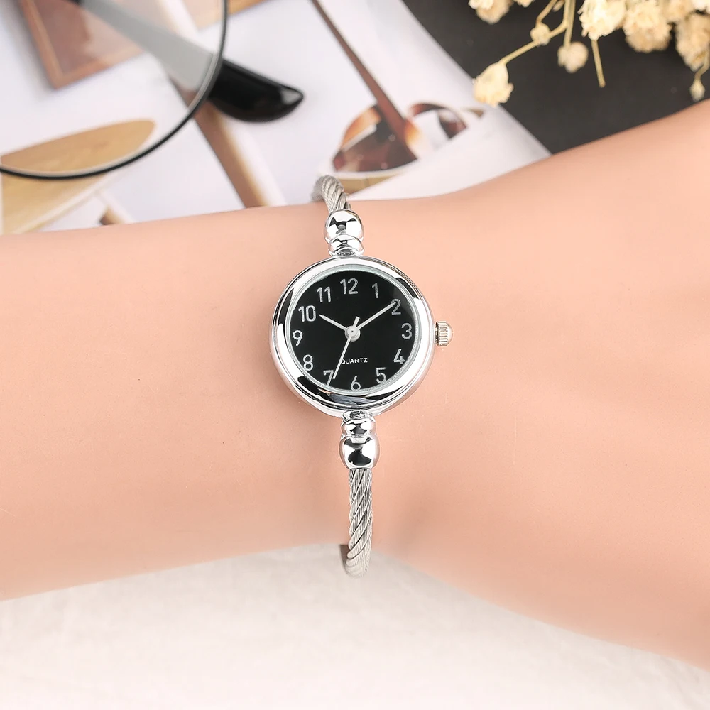 Elegant 2018 New Arrival Women Bangle Watch Roman Number Dial Quartz Wrist Watch Simple Rotating Twist Stainless Steel Band (15)