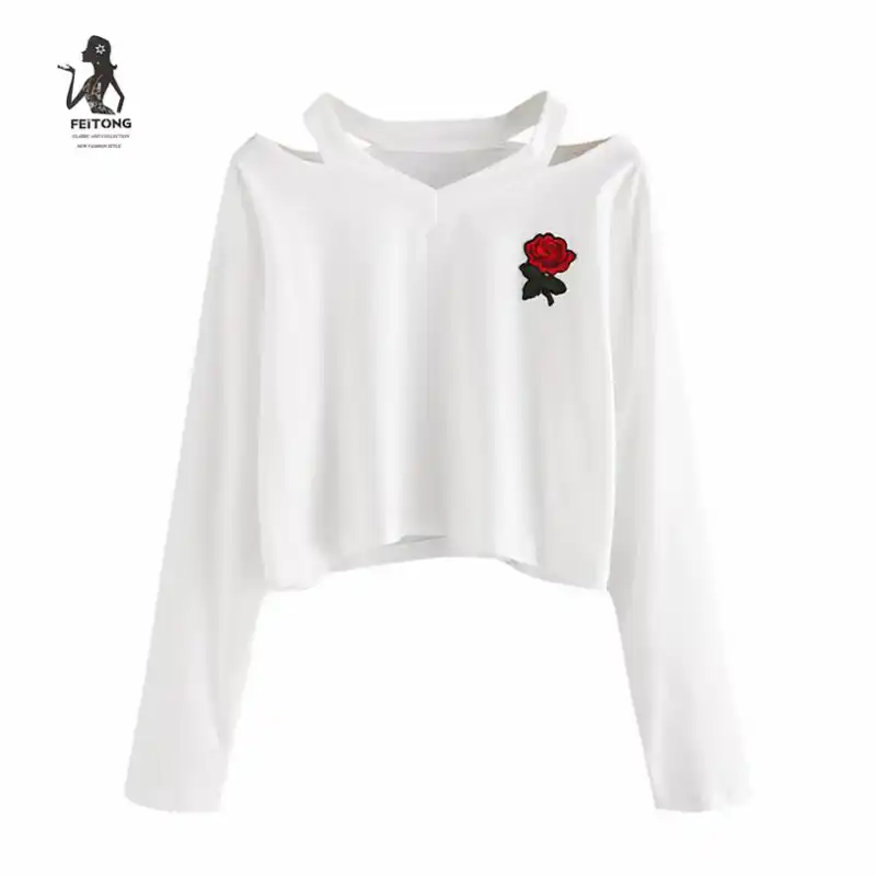 white hoodie with roses on sleeves