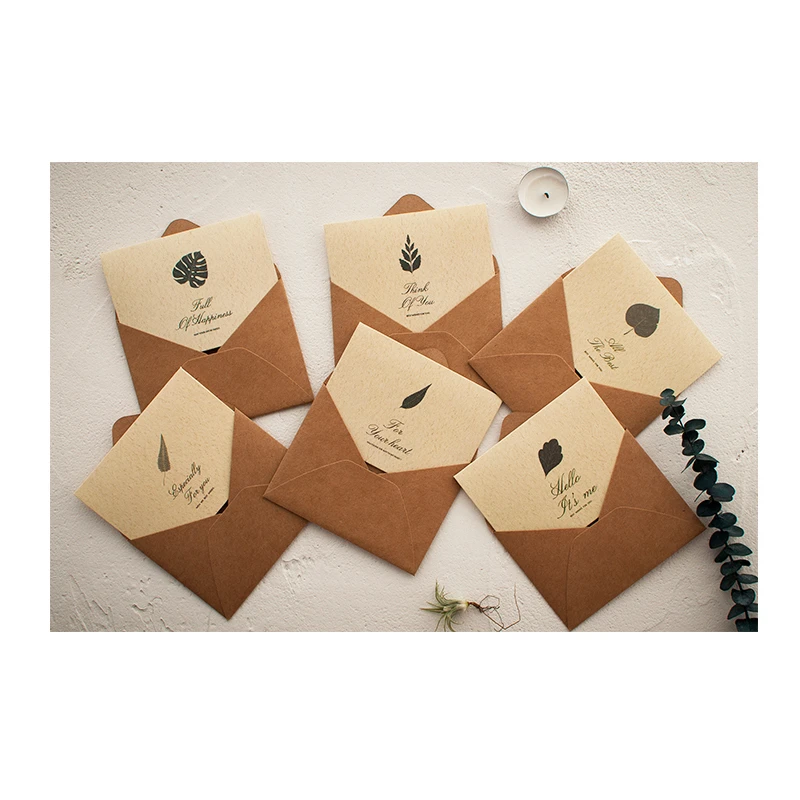

Kraft greeting card yellow kraft envelope green leaf implication heart card Environmental party decoration props invitation car