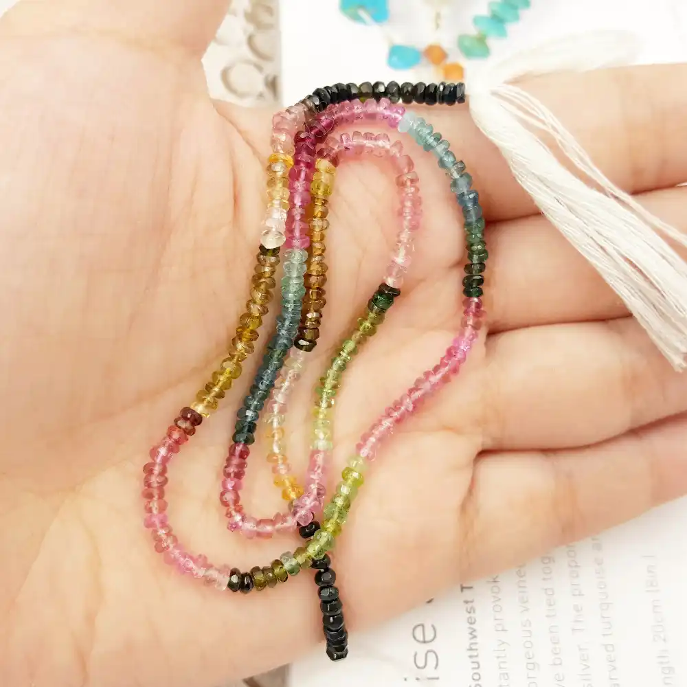 7 St Turmaline Faceted Drop 5x3mm.-Strand 20cm