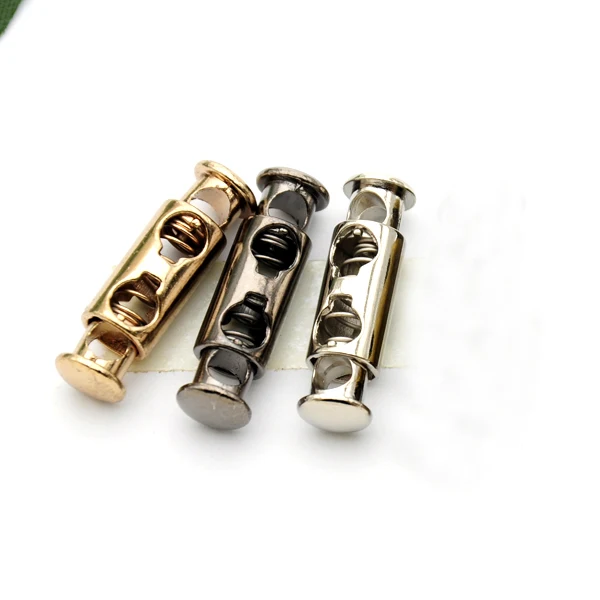 

Wholesale 30pcs/lot 3 colors metal alloy stoppers toggle cord locks Drawstring lock two holes for 4mm cord STP-017
