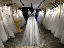 

Custom Made A-line Crystals Prom Dresses 2018 Deep V-Neck Sleeveless Backless Sweep Train Tulle Evening Party Formal Gowns