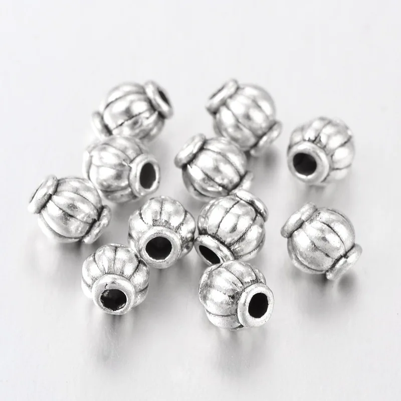 

Pandahall 100pcs 4mm Tibetan Silver Spacer Beads Round Wheel Metal Spacer Beads Charm for Jewelry Making hole: 1mm Drop Shipping