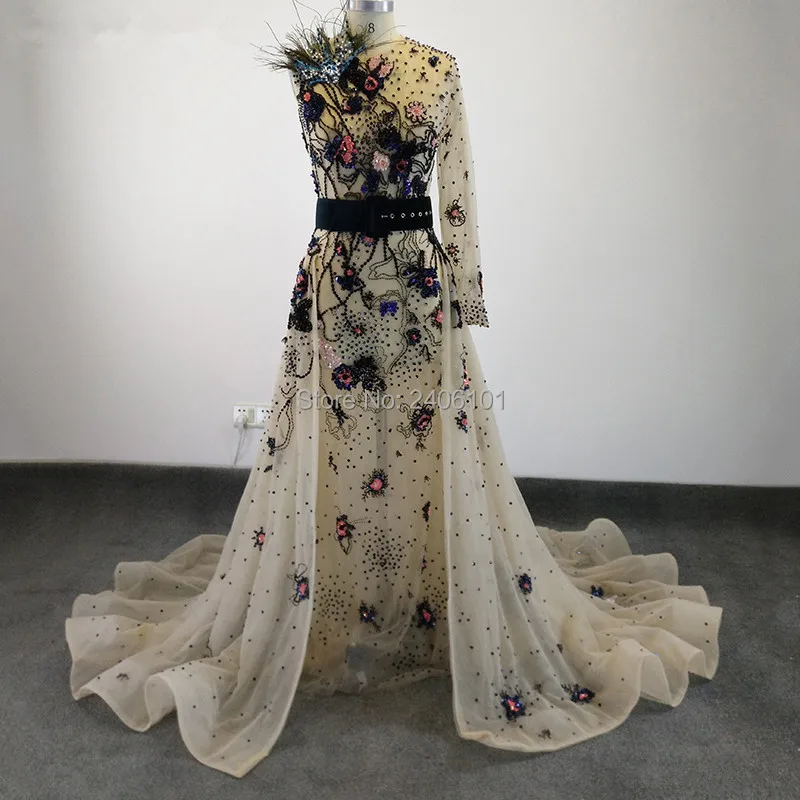 gown with feather shoulders