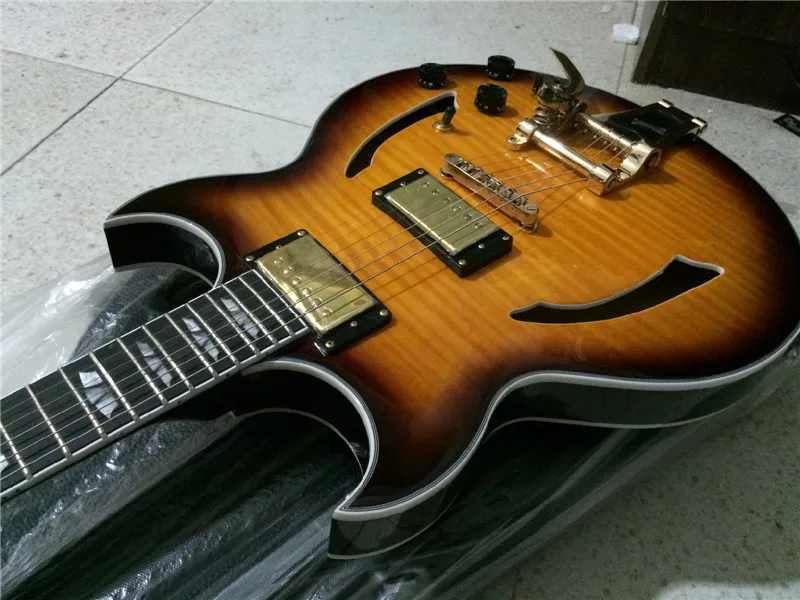 

Electric guitar/hollow sun burst color jazz guitar with big tremolo+GUITARS CHINA