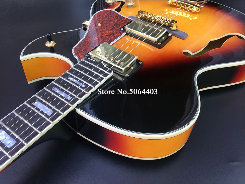 

Factory customized, hollow electric guitar, side tiger stripes, back tiger stripes veneer, gold accessories, pointed flowers, po
