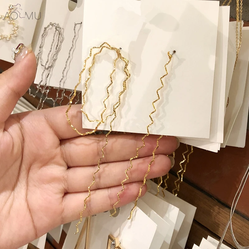 AOMU-Korea-Personality-Metal-Gold-Silver-Geometry-Asymmetrical-Twist-Wave-Line-Snake-Bone-Chain-Long-Tassel (2)_