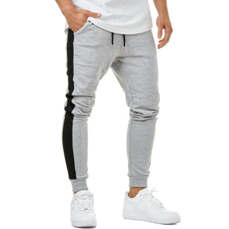 

Trousers men's casual sports pants color matching hip hop fitness stitching trousers micro-elastic low waist cotton feet pants