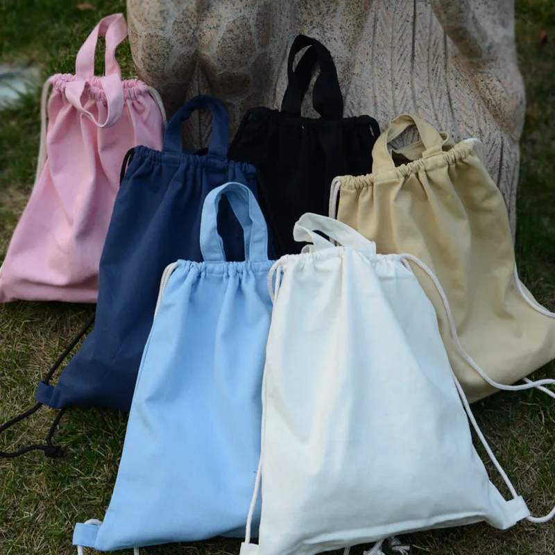 

2019 New Hot Fashion DrawString Canvas Shoulder Bags Female Casual Simple Solid Color Students School Draw Pocket Bags Backpacks