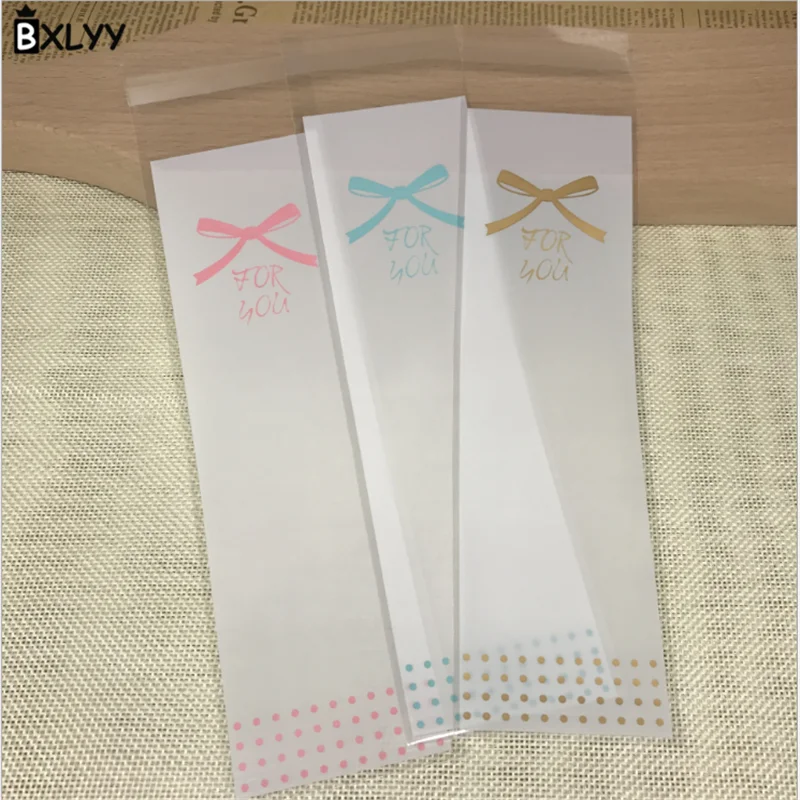 

BXLYY Hot 100pc3 Bow Long Strip Cookie Bag Candy Bag Baking Decoration DIY Baking Accessories Wedding Decoration Accessories.8z