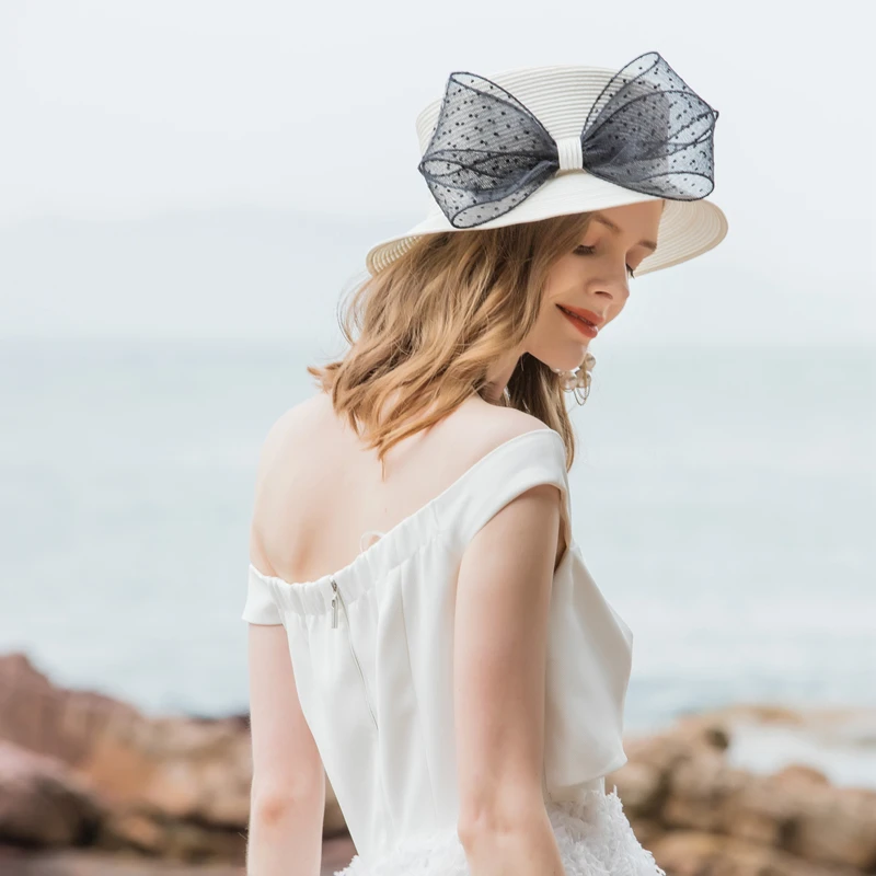 المرأة الشمس حماية القش قبعة الربيع الصيف الأزياء شقة أعلى طنف قصيرة Bowknot كاب سيدة أنيقة واقية من الشمس شاطئ قبعات H6600