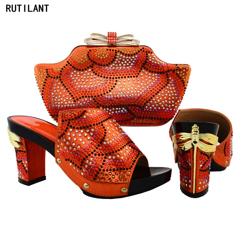 Nieuwe Collectie Oranje Kleur Dames Italiaanse Schoenen en Tas Set Versierd met Strass Nigeriaanse Vrouwen Bruiloft Schoenen en Tas Sets Nieuwe Collectie Oranje Kleur Dames Italiaanse Schoenen en Tas Set Versierd met Strass Nigeriaanse Vrouwen Bruiloft Schoenen en Tas Sets