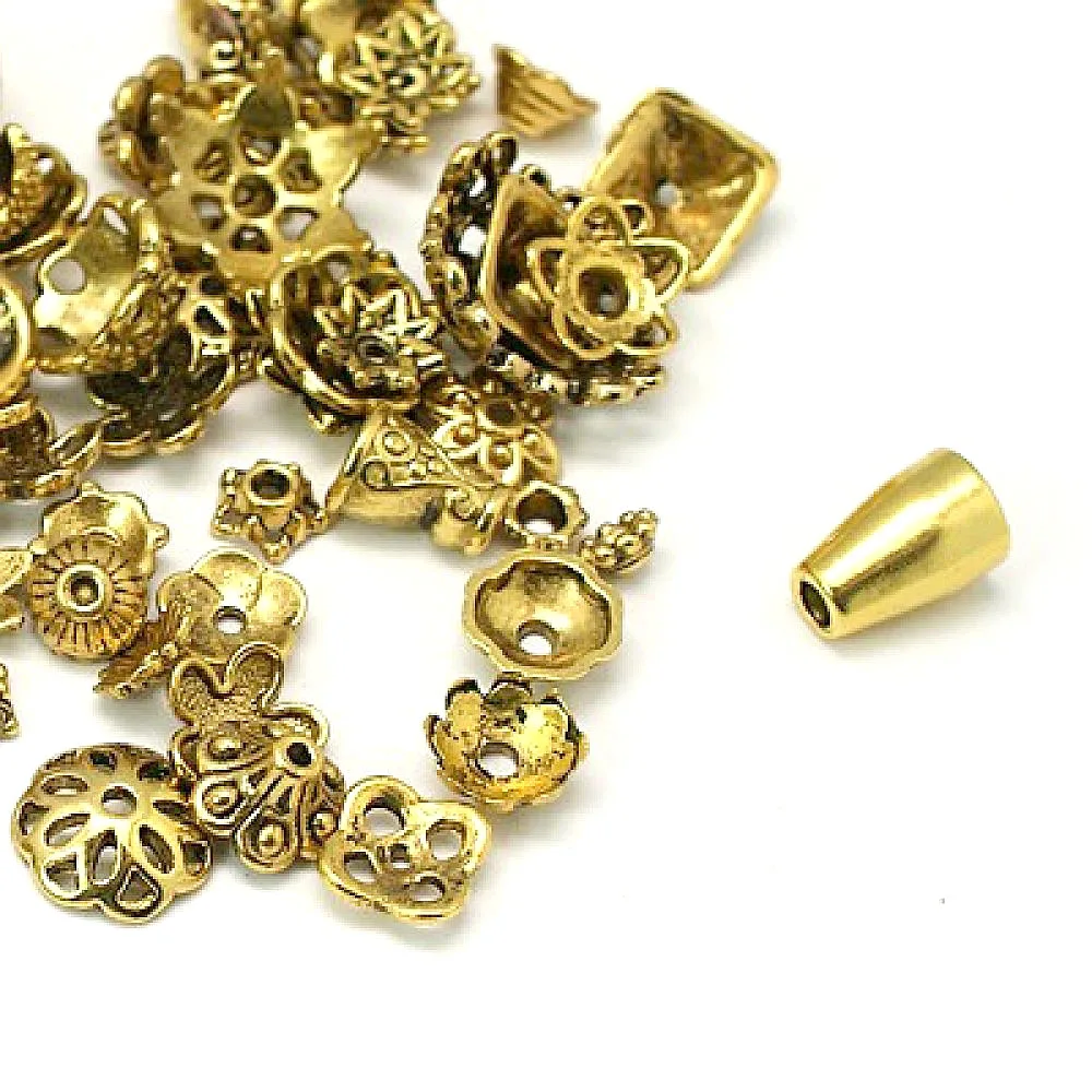 

Pandahall Tibetan Style Beads Caps, Mixed Shape, Antique Golden, about 8~20mm in diameter, 3~8mm thick, hole: 0.5~2mm.