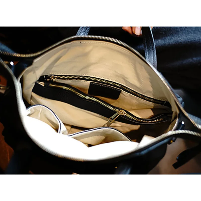 AETOO Simple practical head-layer cowhide pillow bag, leather hundred-hand-held oblique cross woman bag