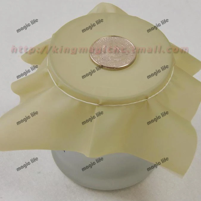 

Pena Coin coin thru rubber sheet into cup Black Hole magic tricks magic props