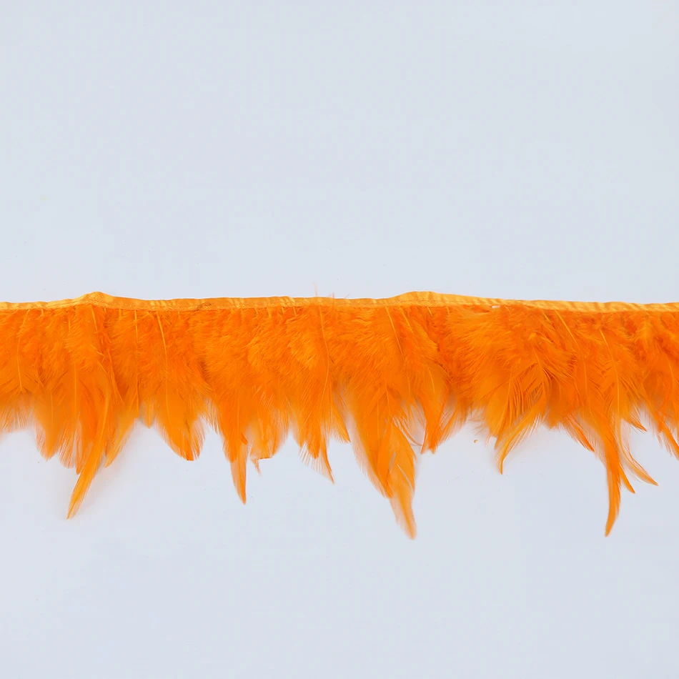 11 orange rooster saddle feather trims 6
