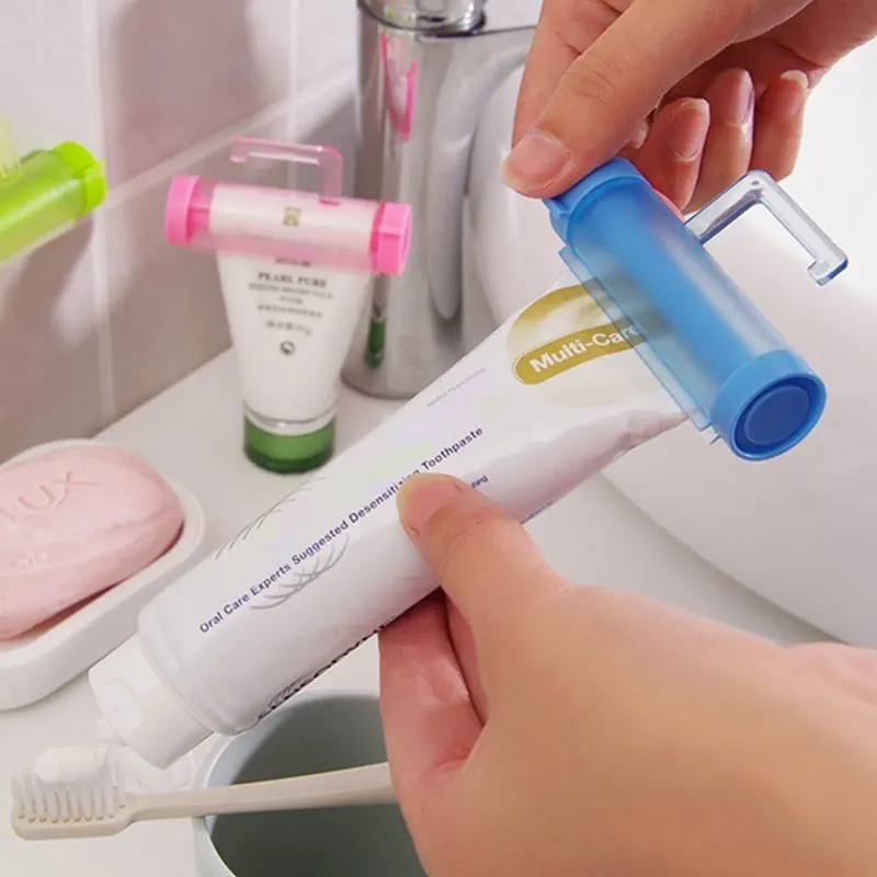 Rolling Toothpaste Dispenser Tube Squeezer Plastic Sucker Hanging Holder Home Dental Cream Bathroom Manual Syringe Gun Dispenser