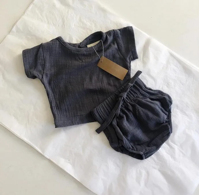 

2019 European and American spring and summer boys and girls flax short-sleeved shirt + belt PP hot pants two-piece baby