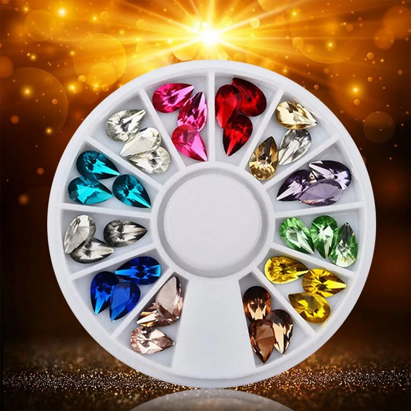 

Hot Sale 36pcs/set Glitter Drop Water Nail Art Decoration Rhinestones Wheel 5X8mm 3D Design Charm Nail Tips Gem Stones Accessory