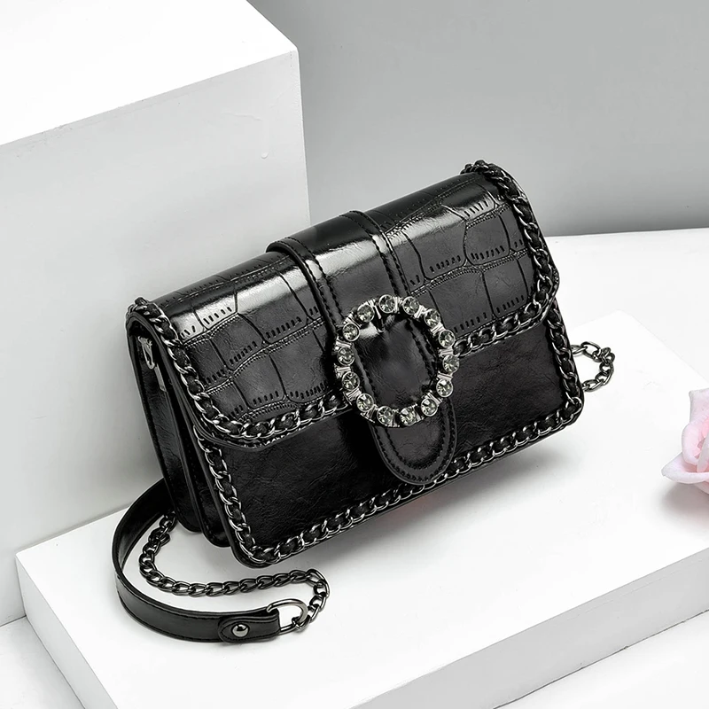

Female 2019 new spring small square handbag fashion brand shine simple ins super hot sell heavy work texture lady shoulder bag