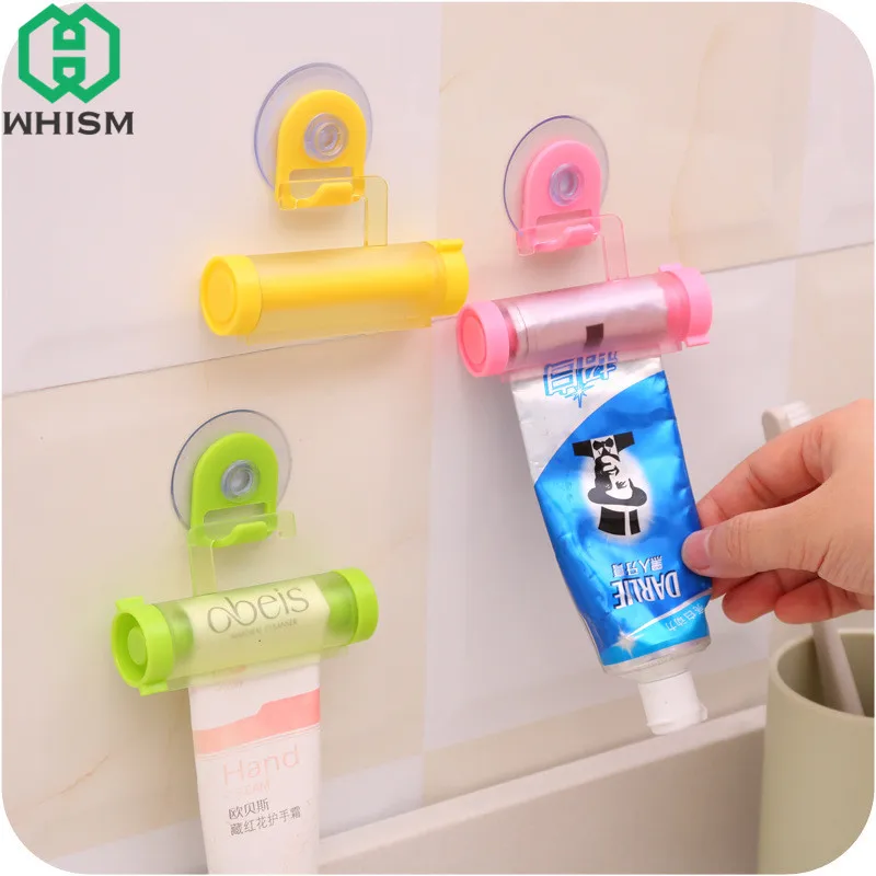 

WHISM Toothpaste Squeezer Plastic Tube Squeezer Rolling Toothpaste Dispenser Suction Cups Holder dispensador de pasta de diente