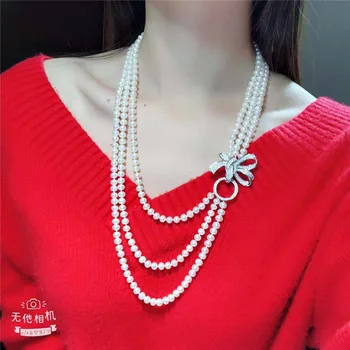 

Hand knotted 3strands 7-8mm white freshwater pearl necklace bowknot micro inlay zircon accessories pearl pendant long 55-65 cm