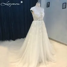 Romantic White Lace Cap Sleeve Wedding Dress Sexy See Through Beading Bridal Gowns 2017 Chic Lace Plus Tulle Trendy Party Dress