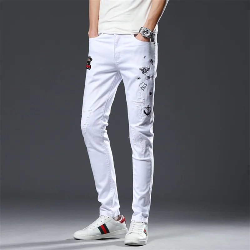 Весенние новые джинсы мужчины 100% хлопок Письмо печати fit тонкий карандаш Штаны Узкие рваные высокого качества дизайн белые джинсы мужские