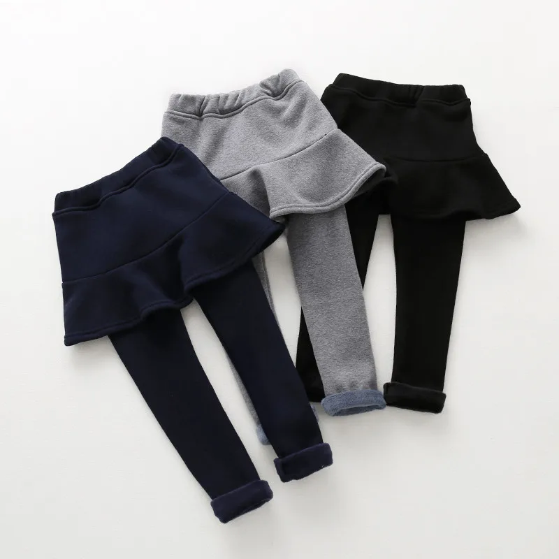 

Free shipping autumn&winter girl plus velvet thickening fake two pieces lotus leaf skirt trousers solid color wild warm leggings