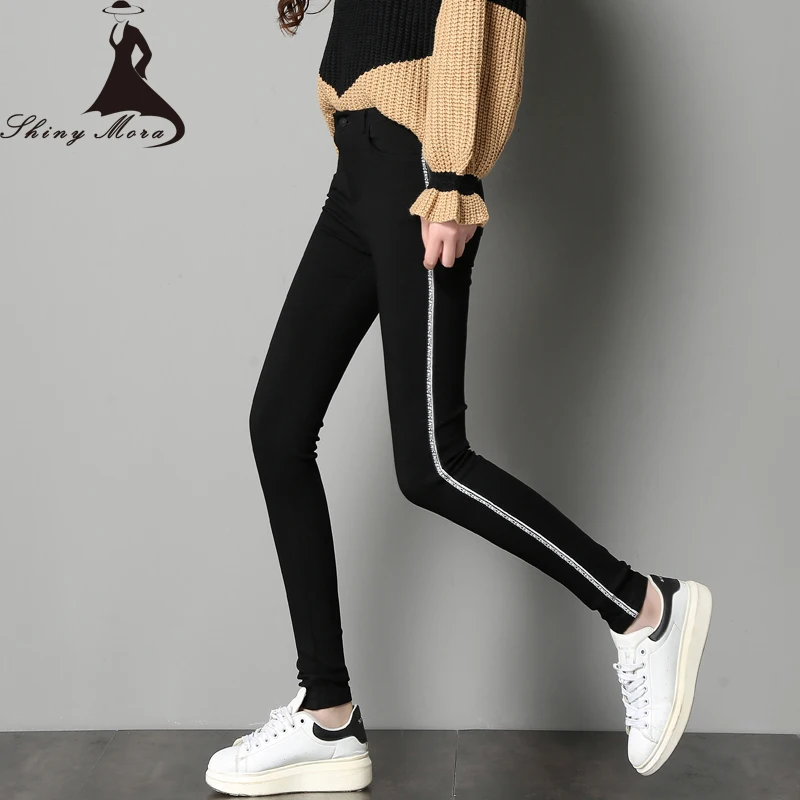 black pants with thin white stripes