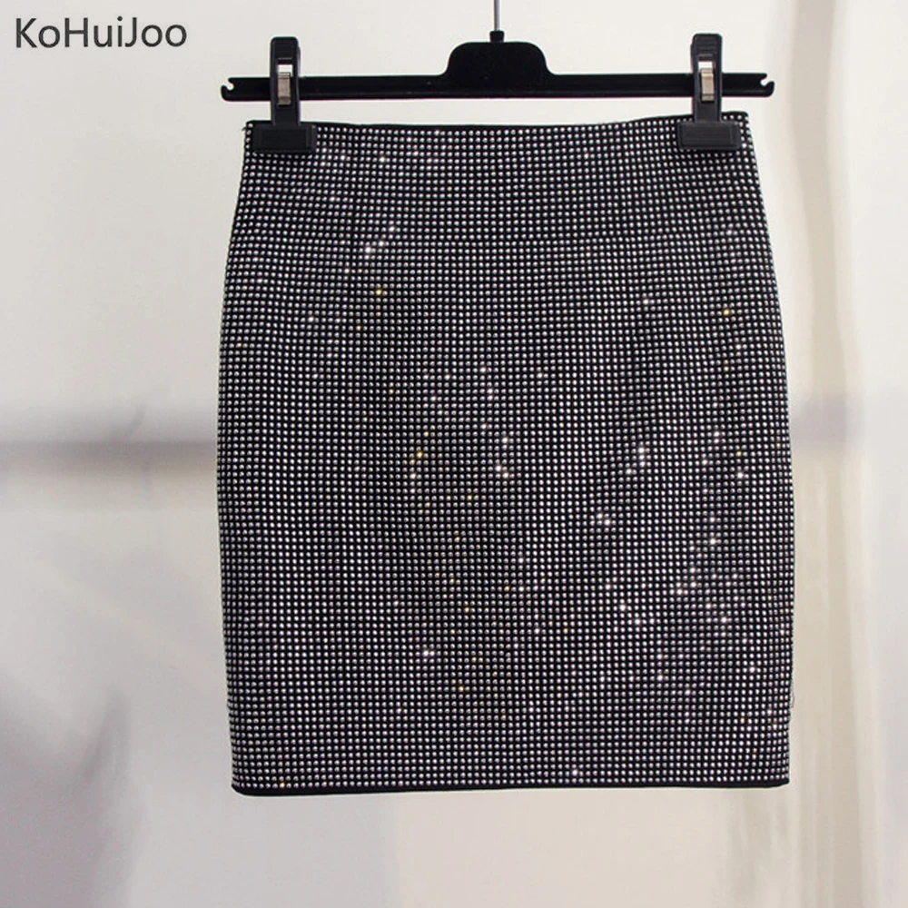 

KoHuiJoo Women Rhinestone Skirt Stretch Glitter Metal Crystal Diamonds Sexy Clubwear Nightclub Mini Skirt Ladies Runway Skirts