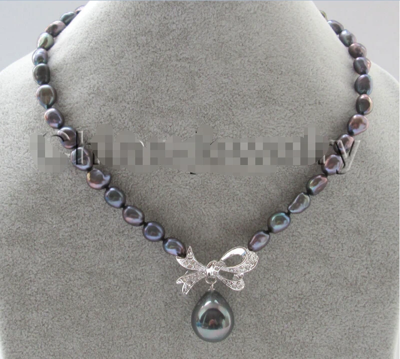 

Fast shipping>>> >>>17 " 9-11mm black color baroque freshwater pearl necklace + butterfly 20mm shell 6.07