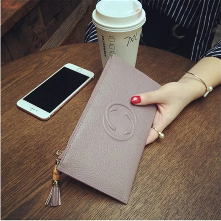 

2019 new European and American thin wallet female long leather zipper soft cowhide Female money clip Big Bill mobile phone bit