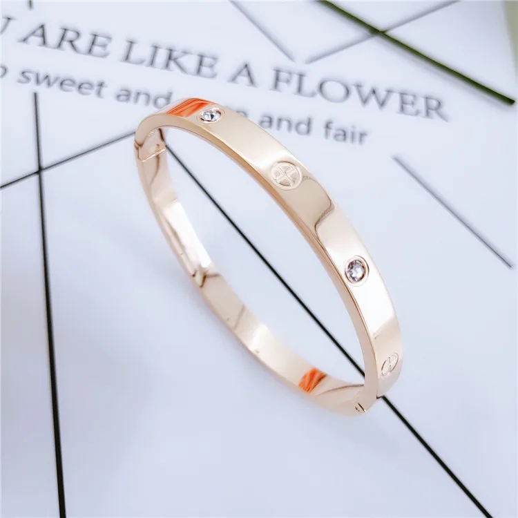 Korean-style Korean style stainless steel love bracelet COUPLE'S Eternal Ring cross pattern buckle full of crystals titanium ste