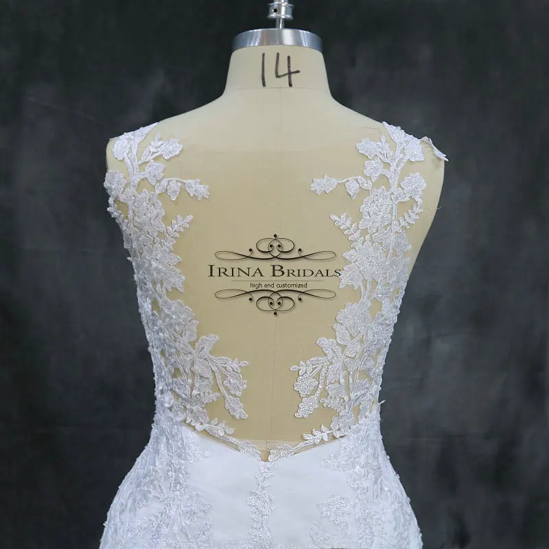 Свадебное платье с кружевной аппликацией Irina Bridals прозрачное рукавами крылышками