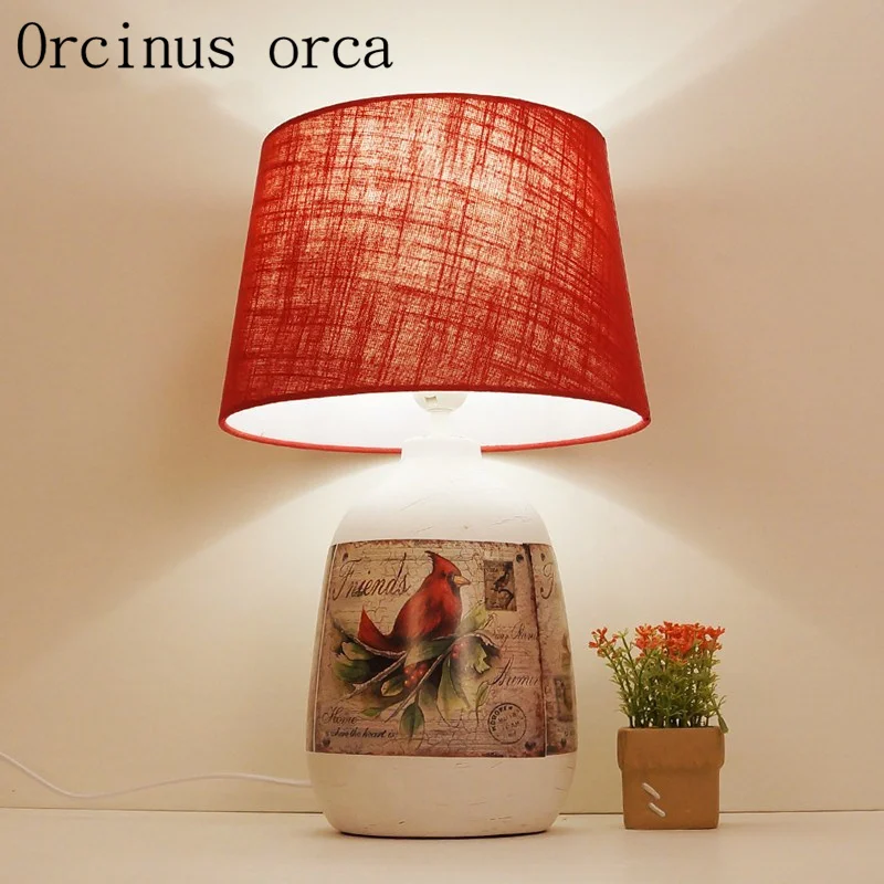 

The Nordic minimalist creative ceramics living room lamp study bedroom bedside lamp romantic wedding room decoration lamp
