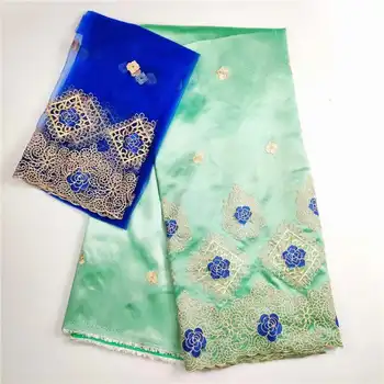 

Green matching blue African George Lace Fabric With Blouse And StonesWedding stones Laces African Gold Line George Material