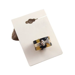 

Fashion Jewelry New Design Wholesale Leopard Pattern Shiny Bowknot Rings for Women