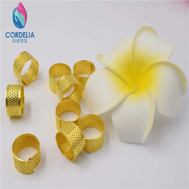 

3 pcs 2016 new fashion gold cooper circular thimble as pin needle shield as cross stitch tool sewing accessories grip protector