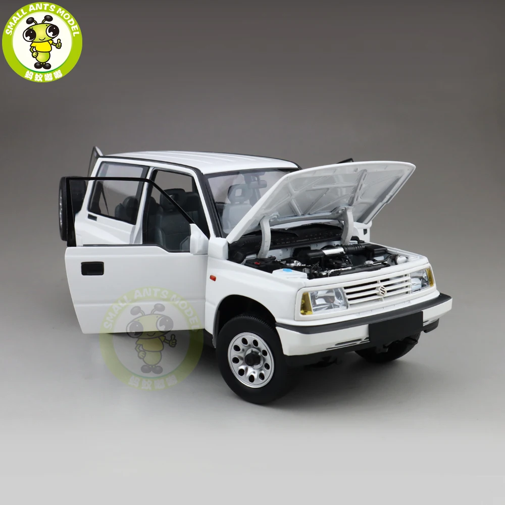 1/18 DORLOP Suzuki Vitara Escudo с левым приводом Модель автомобиля игрушки детские подарки для мальчиков девочек белого цвета