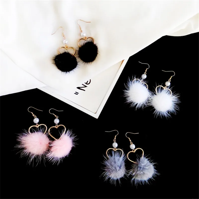 

The new hair bulb earrings Pearl heart-shaped pendant The girl deserve to act the role of party gift