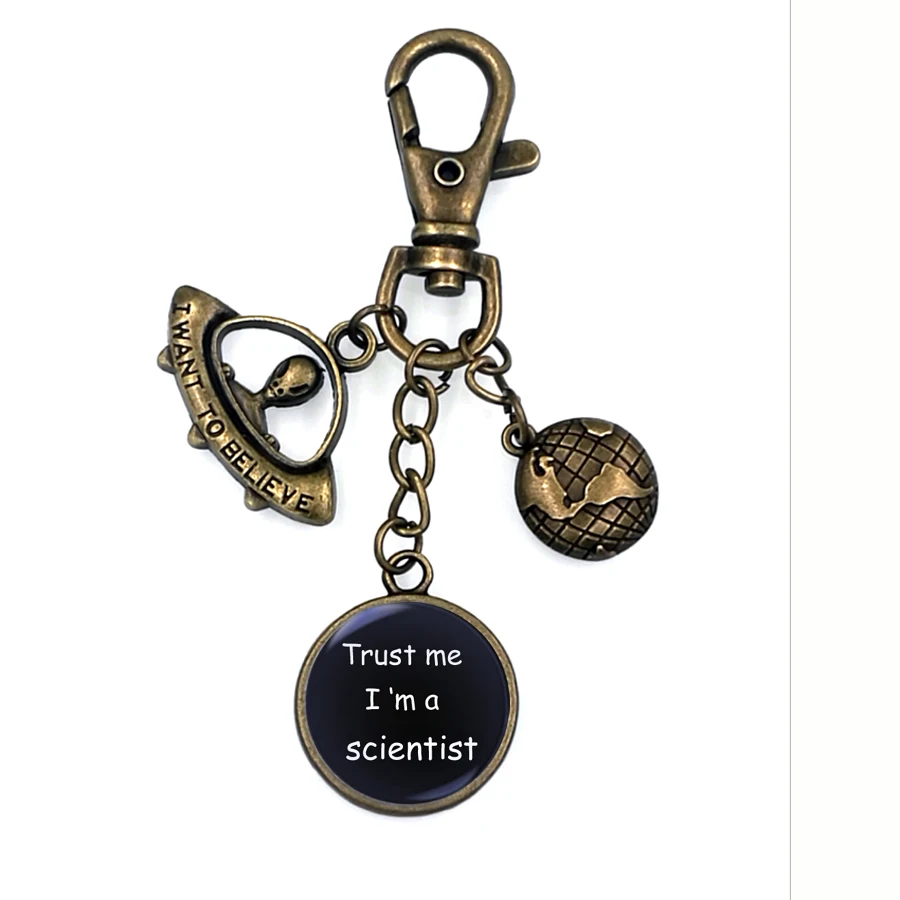 

TURST ME I AM A SCIENTIST CHARM UFO GLOBE PLANET KEYCHAIN ART DOME CAMEO KC011